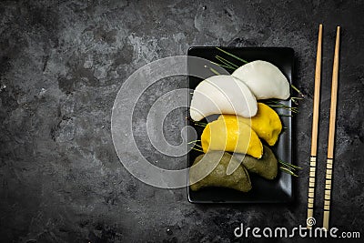 Chuseon day concept, korean thanksgiving day - songpyeon rice cakes on rustic background Stock Photo