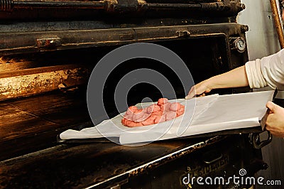 The ciaramicola is a typical Umbrian Easter cake; it is a donut-shaped cake, red in color with white icing and colored topping spr Stock Photo