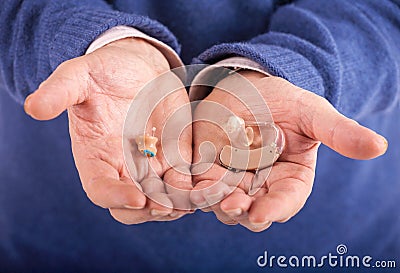 CIC and BTE hearing aids Stock Photo