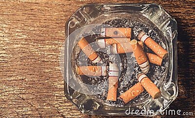 Cigarette smoke is then discarded cigarettes. Stock Photo