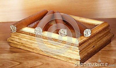 Cigars on tobacco box Stock Photo