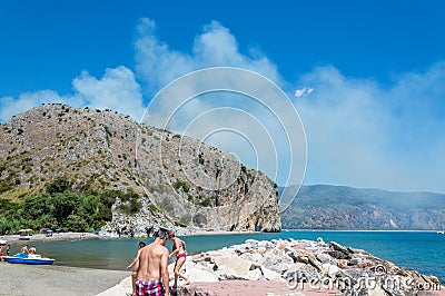 Centola, Italy / 20th July 2016 / Summer fire near Palinuro, Mingardo, Natural Arch Editorial Stock Photo