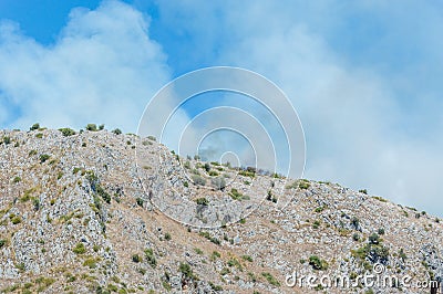 Centola, Italy / 20th July 2016 / Summer fire near Palinuro, Mingardo, Natural Arch Editorial Stock Photo