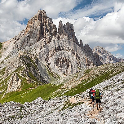 Cima Ambrizzola and Croda da Lago with three hikers Editorial Stock Photo