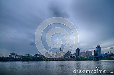 Cincinnati skyline. Image of Cincinnati skyline and historic John A. Roebling suspension bridge cross Ohio River. Stock Photo