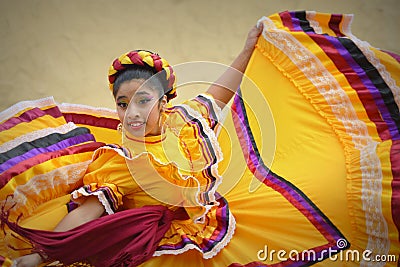 Cinco de Mayo Dancing Girl in Yellow Dress Editorial Stock Photo