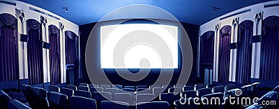 Cinema theater showing empty white movie screen. Stock Photo