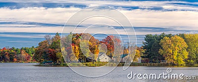 Cinematic Crop of Autumn Vibrant Colors on Apple River Stock Photo