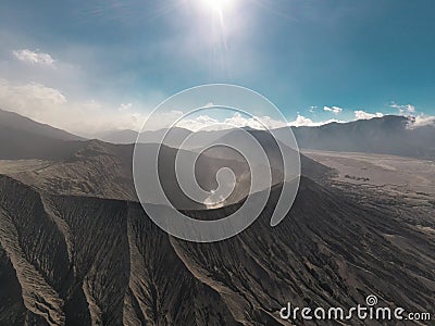 Cinematic shot aerial view of Mount Bromo crater edge in East Java Stock Photo