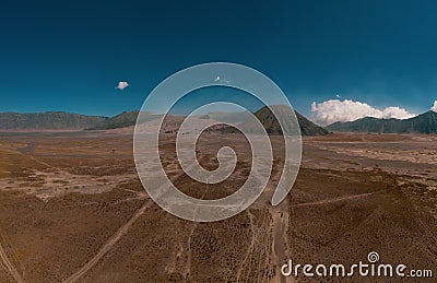 Cinematic shot view of beautiful Mount Bromo volcano with desert in East Java Stock Photo