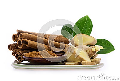 Cinnamon, green leaves,bark ,powder and ginger isolated on white background. Stock Photo