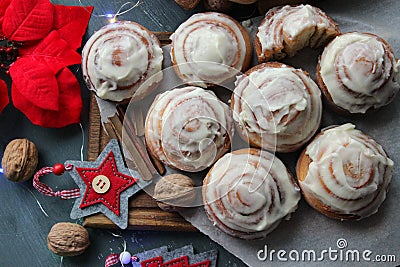 Cinnamon rolls for Christmas. Christmas cakes. Home baking cinnamon rolls for the new year and Christmas holidays. Stock Photo