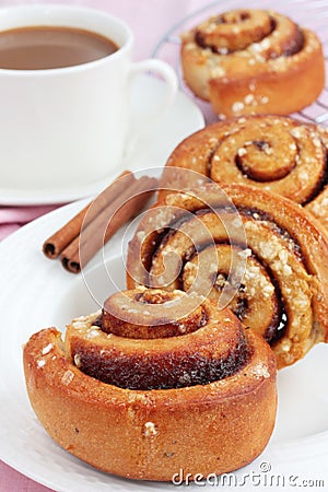 Cinnamon rolls and a cup of coffee Stock Photo