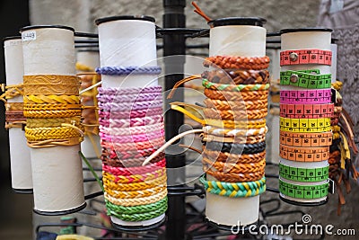 Cinque Terre, Italy - colorful bracelets displayed outside a store. Local souvenirs sold in Riomaggiore. Stock Photo