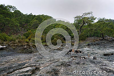 Chimera, burning rocks are remarkable spot ot the trail of Lycian way near Cirali, Antaly Stock Photo