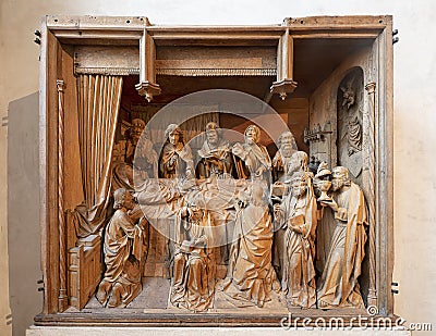 Circa 1500 oak high-relief sculpture titled `The Dormition of the Virgin` in the Cloisters in New York City. Editorial Stock Photo