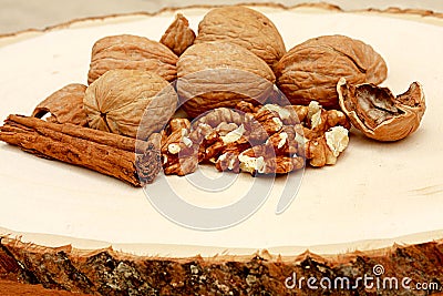 Circassian walnut on wood background Stock Photo