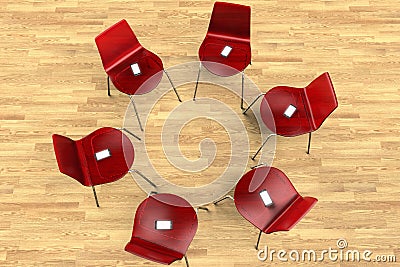 Circle of chairs with smartphones Stock Photo