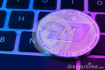 Circle Dash coin on top of computer keyboard buttons. Digital currency, block chain market, online business Stock Photo