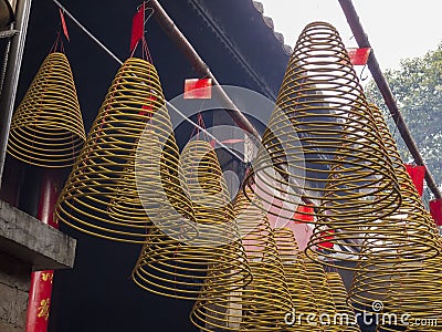 Circle incense offerings in temple Stock Photo