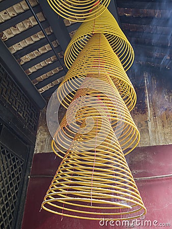 Circle incense offerings in temple Stock Photo