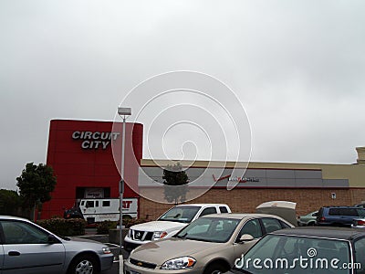 Circuit City, Verizon Wireless Stores and AT Systems Van on a foggy day Editorial Stock Photo