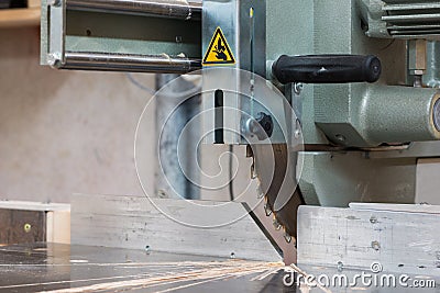 Circular buzz saw on table with rail and grip Stock Photo