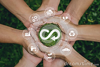 Circular economy concept.Group of poeple holding to wolrd.The concept of eternity, endless and unlimited, circular economy for Stock Photo