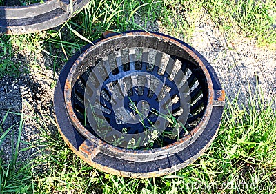 Circular metal drain cover Stock Photo