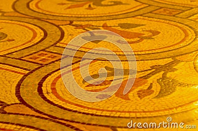 A circular pattern of mosaic floor tiles with flowers. Stock Photo