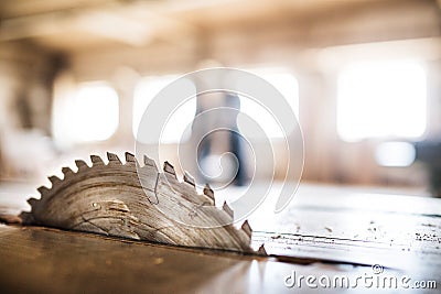 A circular saw blade in carpentry workshop. Stock Photo