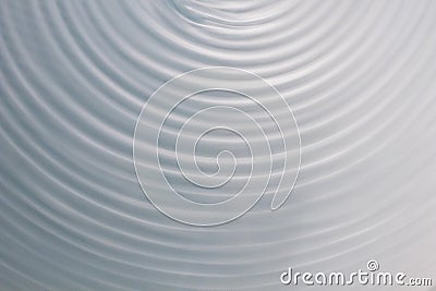 Circular wave motion in a fluid system. blue gray background for Stock Photo