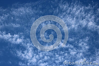 Cirrocumulus clouds seen against blue sky Stock Photo