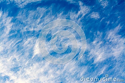 Cirrus clouds float on the blue sky Stock Photo