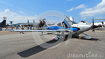 Cirrus S$22 single turboprop aircraft on display at Singapore Airshow Editorial Stock Photo