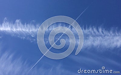 Cirrus type wispy cloud formation with arrow type effect Stock Photo