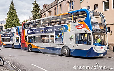 Citi double-decker buses queued up outside grand arcade bus stop, Cambridge Editorial Stock Photo