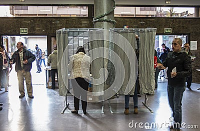 Citizens voting at electoral college in Madrid, Spain, at the Spanish general elections day Editorial Stock Photo