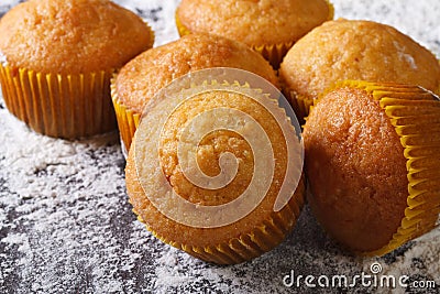 Citrus delicious muffins macro, on floured table top view Stock Photo