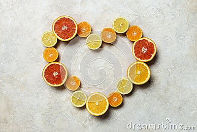 Citrus fruit heart background for your text Stock Photo