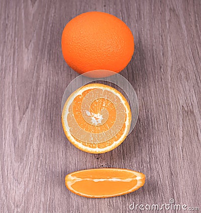 Citrus fruits are lined from whole to sliced Stock Photo