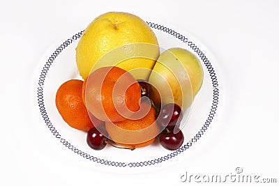 Citrus fruits on the plate Stock Photo