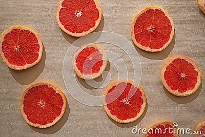 Citrus slices on a beige background. Stock Photo