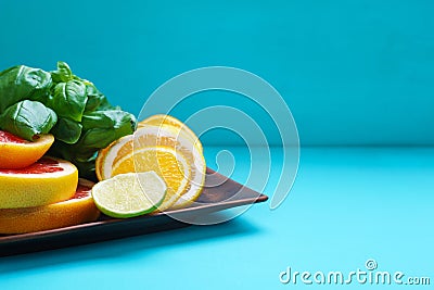 Citrus slices on the plate. Sliced grapefruit, lemon, lime and o Stock Photo