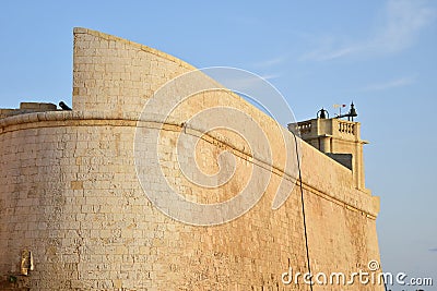 CITTADELLA, GOZO, MALTA - Oct 11, 2014: Part of the defensive walls, bastions and watch towers of the old Cittadella city in Gozo Stock Photo