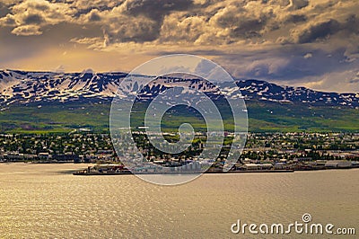 City of Akureyri with snowy mountains and fjord Eyjafjordur in northern Iceland Stock Photo