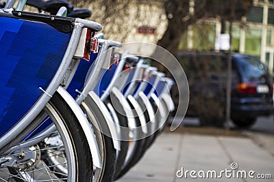 City Bike Rental - Stock Image, a row of bikes for hire as part of a new scheme to encourage Stock Photo