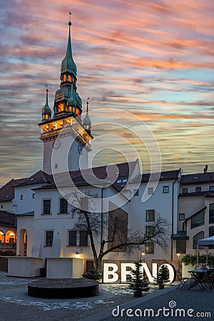 The city of Brno - a square which is illuminated by the inscription BRNO. In the background the church tower. Editorial Stock Photo