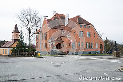 City Cesis, Latvia Republic. 17th century marriage building and street with traffic. 2. November Editorial Stock Photo