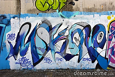 The city graffiti on the cement wall Editorial Stock Photo